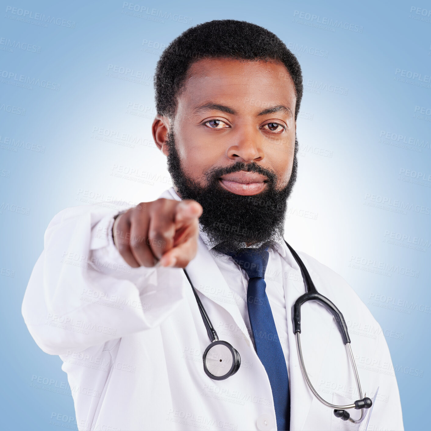 Buy stock photo Black man, portrait and doctor pointing to you for healthcare selection against a blue studio background. Face of African male person or medical professional in decision or choice for clinic checkup