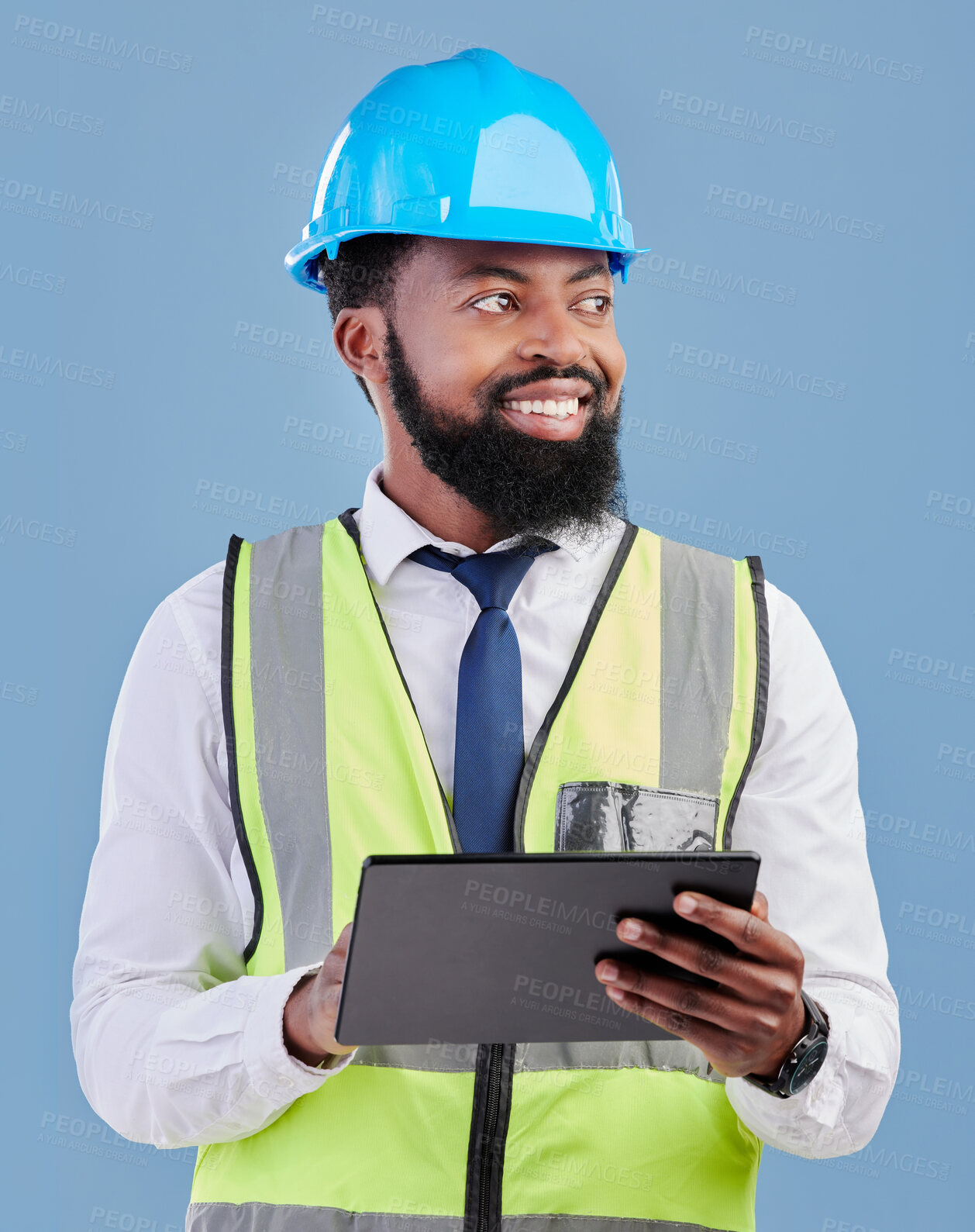 Buy stock photo Happy black man, architect and tablet for construction inspection against a blue studio background. African male person, engineer or contractor working on technology for architecture or project plan