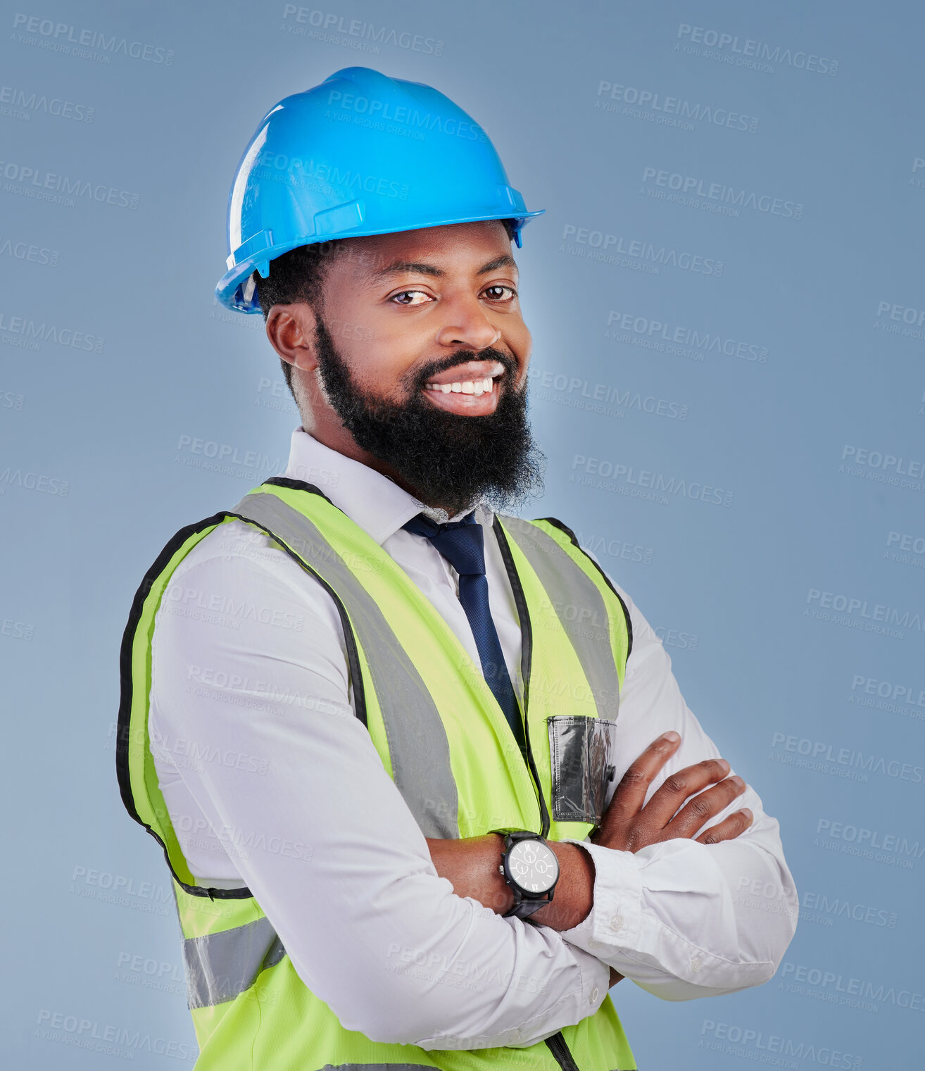 Buy stock photo Construction, black man and portrait with arms crossed in studio for building inspection, engineering or industrial development. Happy male architect, contractor or project manager on blue background