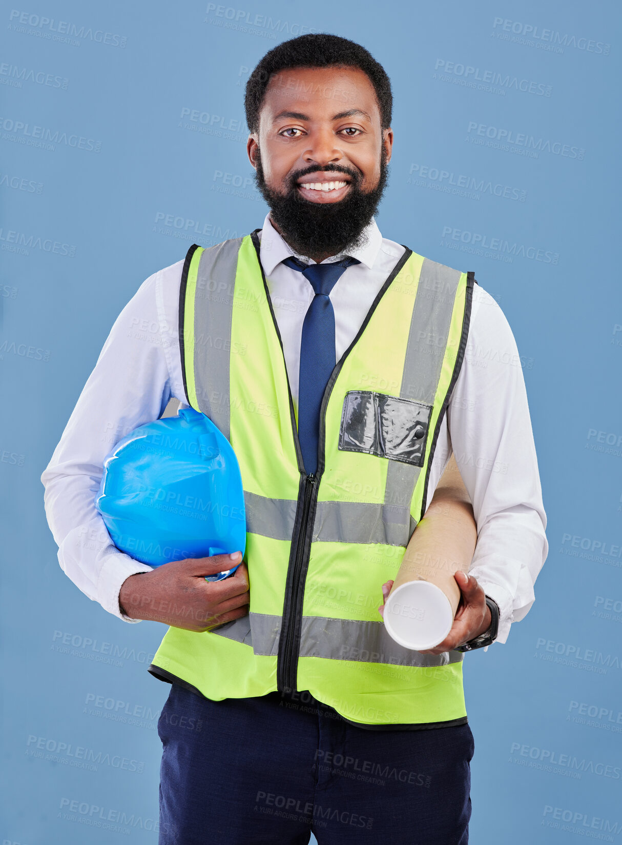 Buy stock photo Happy black man, portrait and construction blueprint in studio for safety inspection, maintenance or architecture. Engineering, contractor and industrial manager with building plan on blue background