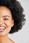 Skincare portrait, afro and African happy woman with studio beauty, skin cosmetics glow or healthy hair texture. Half face makeup, comedy humour joke and wellness person laughing on white background