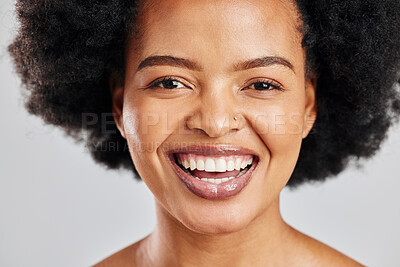 Buy stock photo Beauty, portrait and African woman laughing with skincare shine, studio cosmetics and natural aesthetic makeup. Comedy joke, humour and afro face of happy person with self care on white background