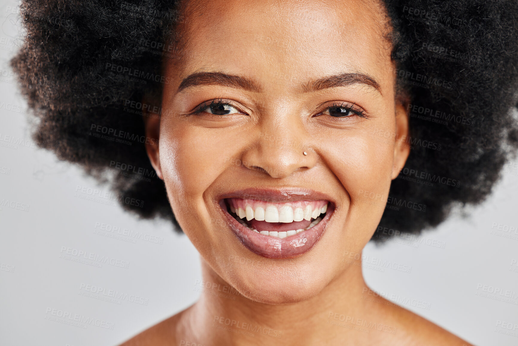 Buy stock photo Beauty, portrait and African woman laughing with skincare shine, studio cosmetics and natural aesthetic makeup. Comedy joke, humour and afro face of happy person with self care on white background