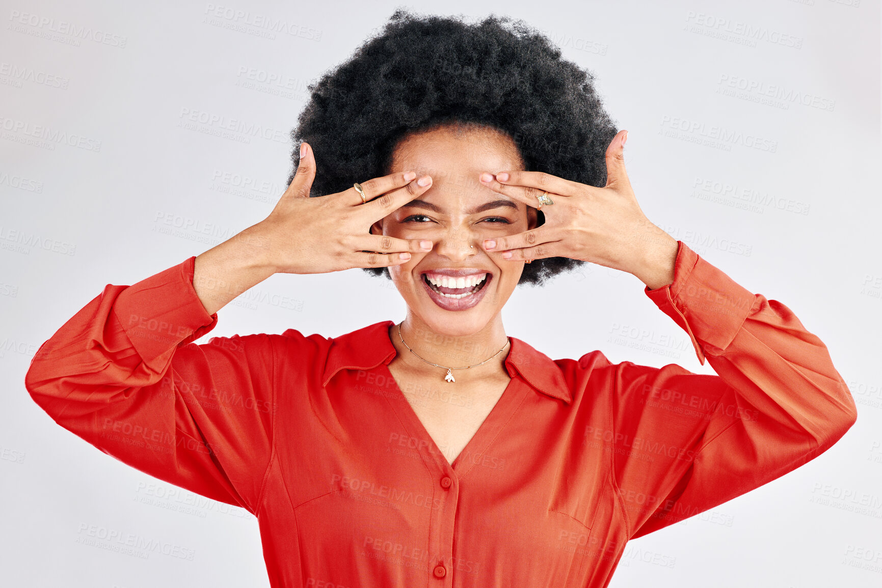 Buy stock photo Crazy, smile and portrait of a black woman on a studio background for funny, comic and laughing. Happy, excited and a young African model or corporate employee with a hand gesture by the face