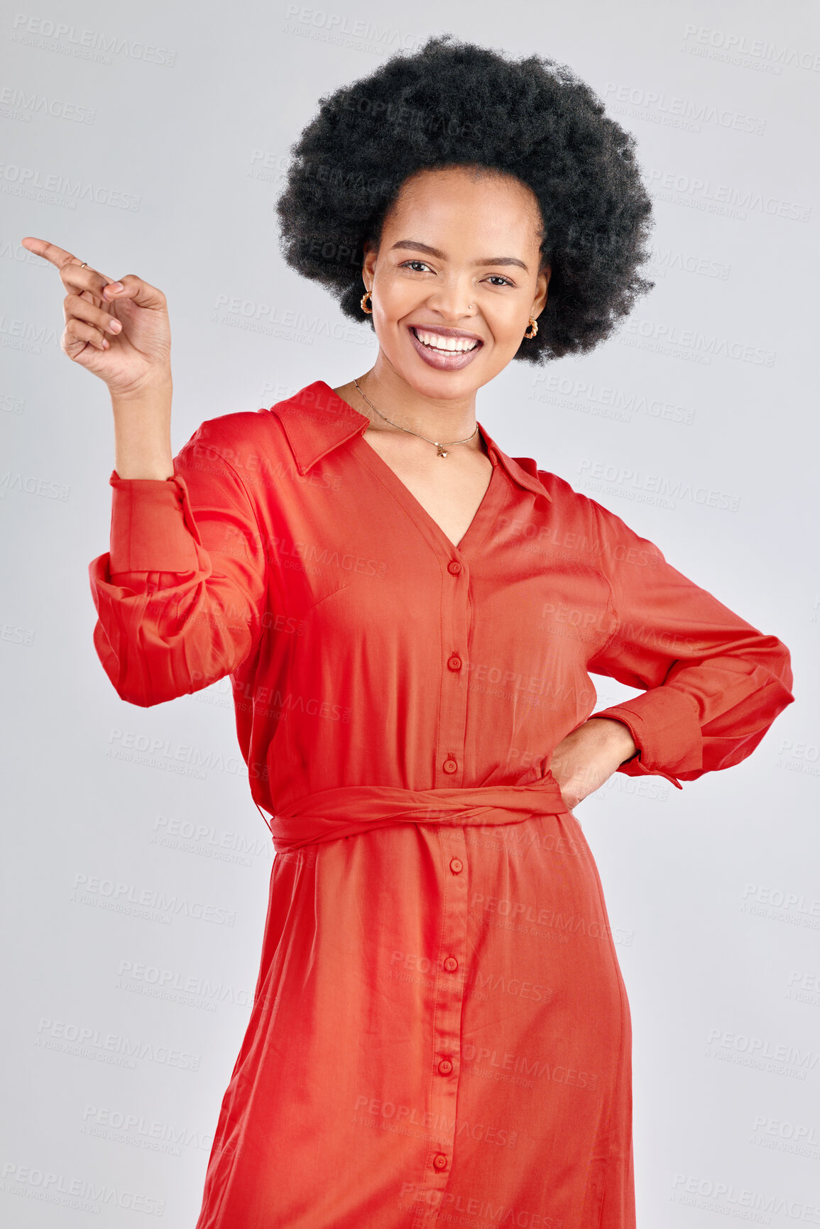 Buy stock photo Pointing, portrait and black woman with a  smile, promotion and presentation against a white studio background. Happy, female person or model with hand gesture, happiness or discount deal with a sale