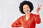 Crazy, peace sign and portrait of a black woman on a studio background with an emoji. Smile, funny model and an African girl or employee with a hand gesture isolated on a backdrop for comedy