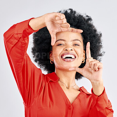 Buy stock photo Portrait, happy black woman and finger frame in studio to review profile picture on white background. Face of female model planning perspective for photography, creative inspiration and hand sign