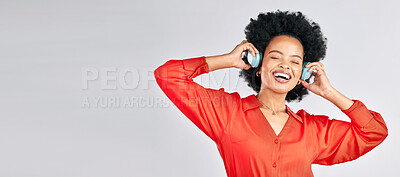 Buy stock photo Black woman, music and headphones in mockup studio for podcast, subscription and banner space on white background. Face, freedom and happy model streaming radio, listening to sound and hearing audio