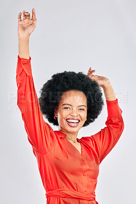 Buy stock photo Happy black woman, portrait and dancing with afro in stylish fashion against a white studio background. Excited African female person in celebration for winning, achievement or bonus promotion