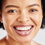 Portrait, skin care and beauty of a black woman with dermatology, cosmetics or natural makeup. Closeup and face of happy African female model in studio for facial glow, self love and teeth smile