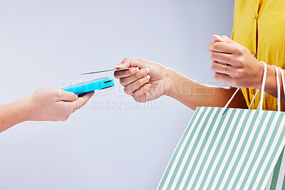 Buy stock photo Card machine, shopping POS and woman hands, online payment and digital service or fashion fintech in studio. Retail, bag and credit of customer, cashier or people at point of sale on white background