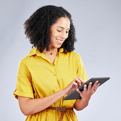 Buy stock photo Tablet, ecommerce or happy woman in studio on social media, chatting app or internet scrolling online. Networking, research or entrepreneur typing on digital technology on white background with smile