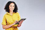 Smile, email and portrait of a woman with a tablet on a studio background for communication. Happy, work and a young girl or employee typing on technology with mockup space for an app or internet