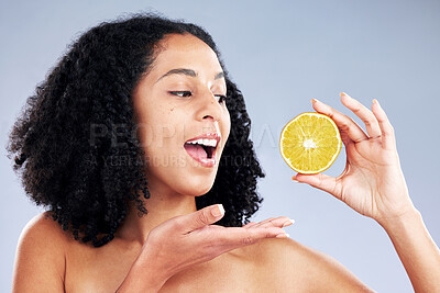 Buy stock photo Skincare, excited and woman with lemon in studio isolated on a white background. African model, natural food and fruit for nutrition, vitamin c and healthy diet for beauty benefits, wellness or vegan