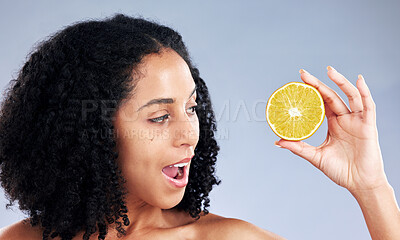 Buy stock photo Woman, lemon and thinking for skincare, studio and wow for natural results for health by background. Girl, African model and fruit for cosmetics, self care and surprise with idea, aesthetic and glow