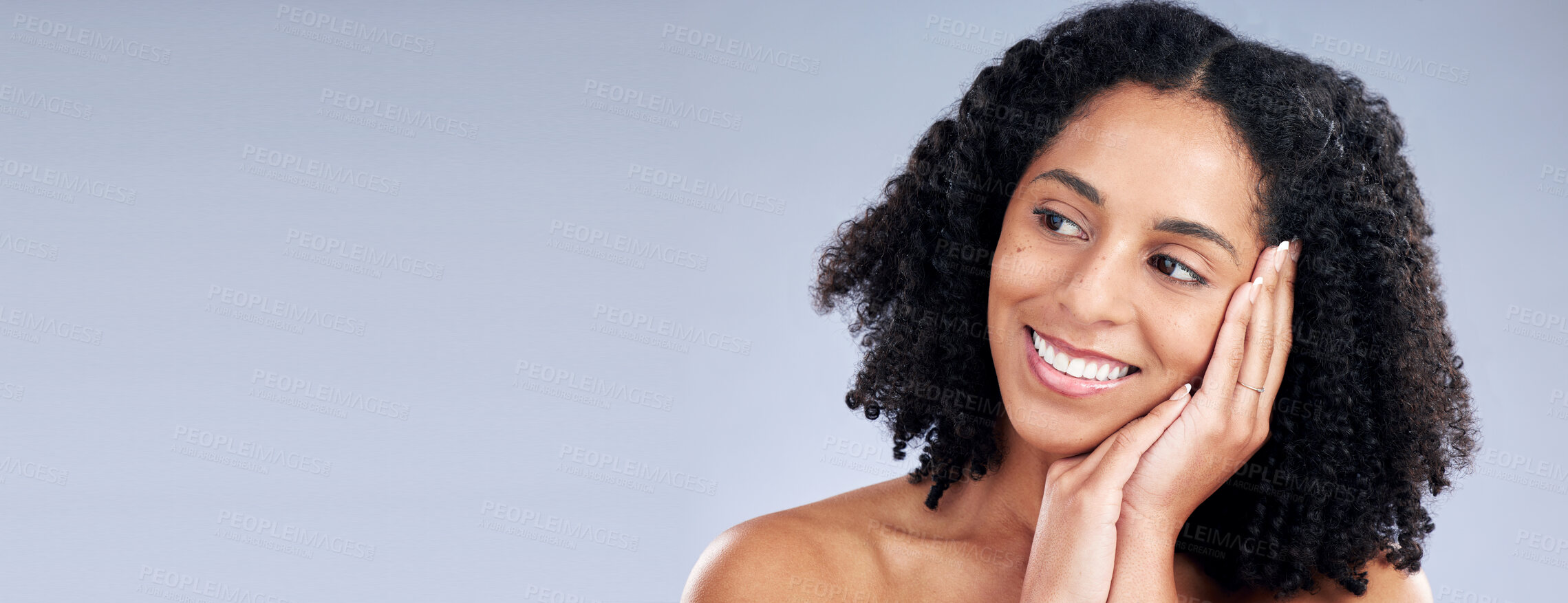 Buy stock photo Face, beauty and mockup with a woman thinking in studio on a gray background banner for skincare. Smile, idea and space with a young female model advertising or marketing luxury wellness or treatment