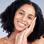 Beauty, portrait and a woman with hands on face for dermatology, cosmetics and natural makeup. Closeup of a happy African female model on a studio background for facial skin care, glow or teeth smile