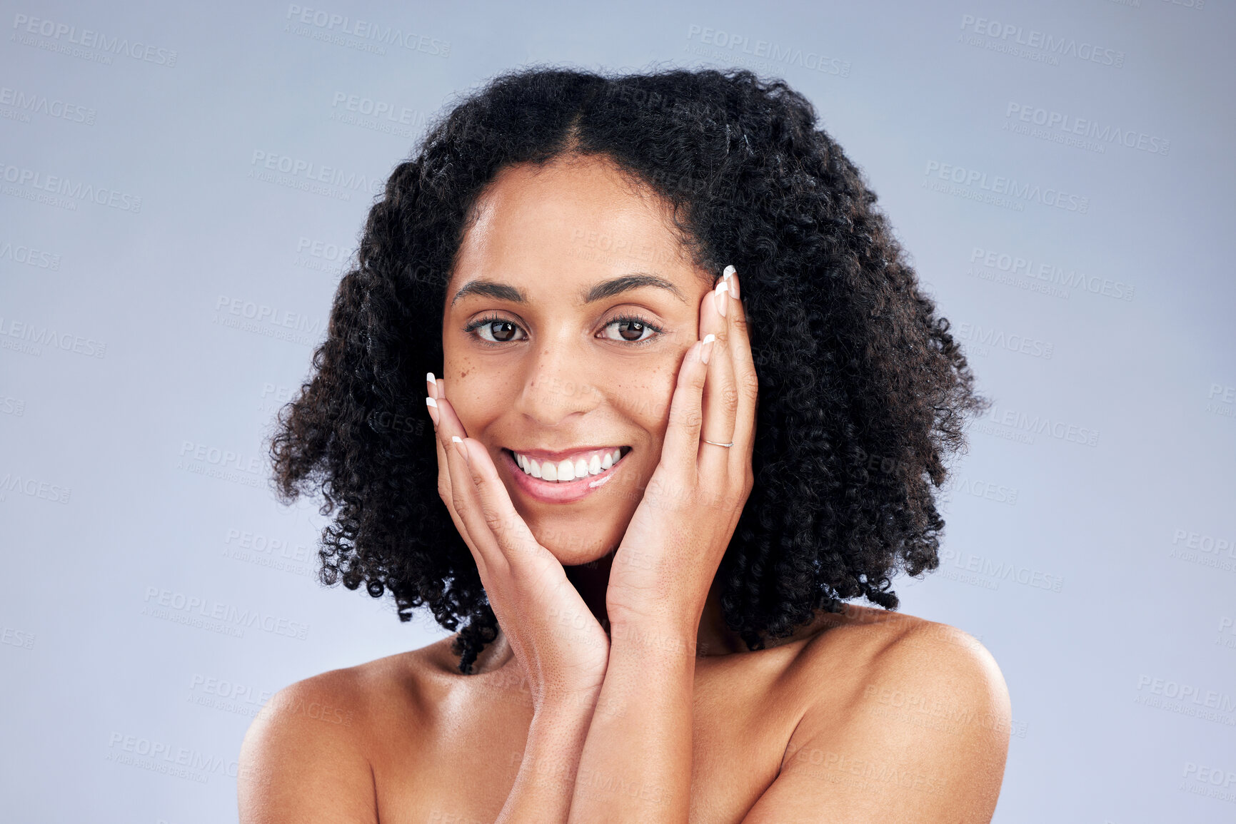 Buy stock photo Skin, beauty and a woman with hands on face for dermatology, cosmetics and natural makeup. Portrait of a happy african female model on a studio background for facial self care, glow and soft touch