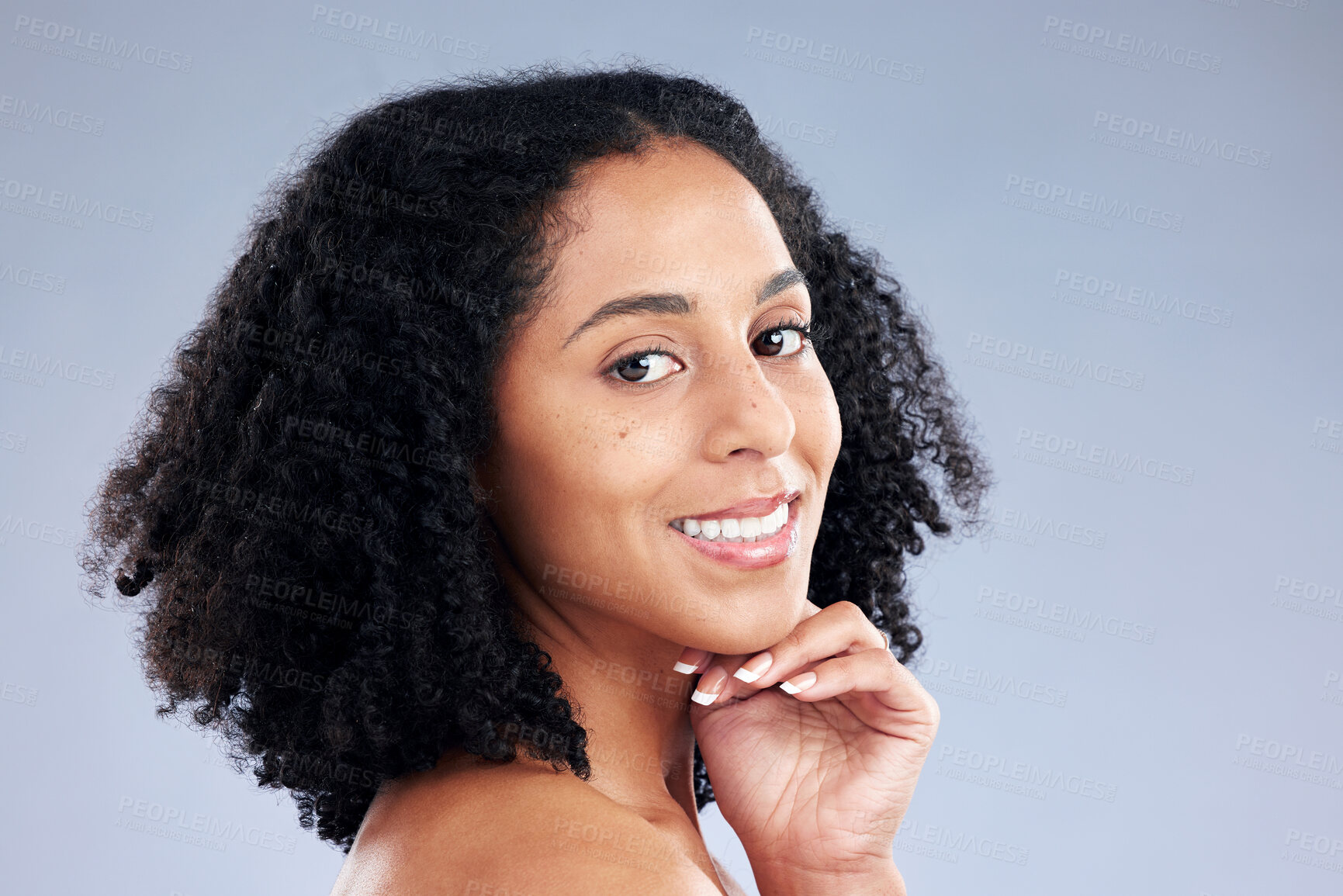 Buy stock photo Portrait, beauty and smile with a model woman in studio on a gray background for skincare. Face, aesthetic and happy with a young African female person at the salon for natural wellness or treatment