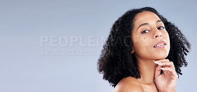 Buy stock photo Portrait, beauty and space with a model black woman in studio on a gray background for skincare. Face, aesthetic and mockup with a young female person at the salon for luxury wellness or treatment