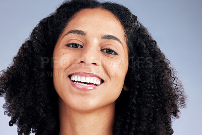 Buy stock photo Face, beauty and portrait a happy woman with skin care, dermatology and cosmetics or natural makeup. African female model on studio background for facial shine, glow and teeth smile for wellness