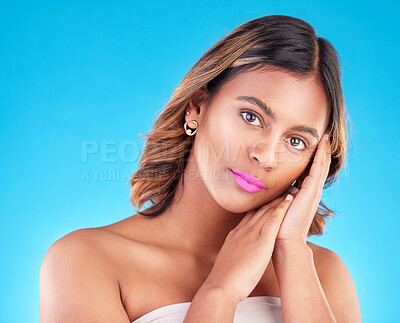 Buy stock photo Woman, face and beauty and pink lipstick, skincare and makeup with cosmetics on blue background. Color, bold and wellness with self care, healthy skin glow and dermatology, female model in a studio