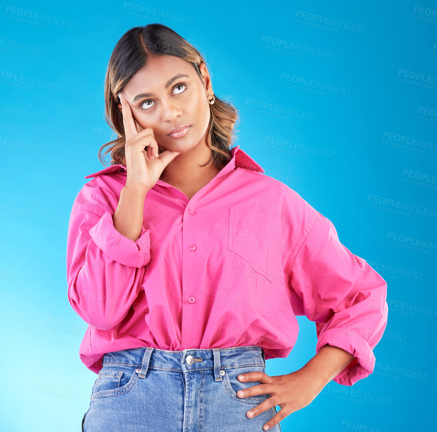 Buy stock photo Thinking, tired and stress with face of woman in studio for doubt, confused and brain fog. Mental health, burnout and anxiety with person on blue background for frustrated, idea and problem mockup