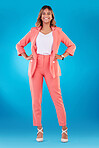Fashion, happy and portrait of business woman in studio confident for career, job and startup. Corporate, professional and female person with trendy clothes, pride and formal style on blue background