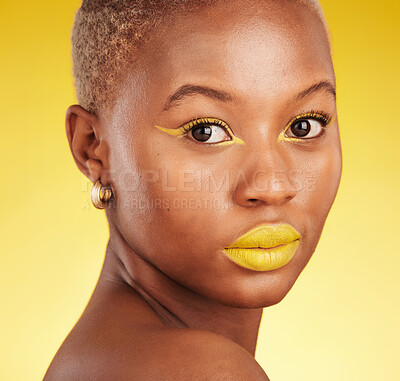 Buy stock photo Beauty, makeup and portrait of a woman in a studio with eyeliner and lipstick for cosmetology. Self care, cosmetic and young African female model with a colorful face routine by a yellow background.