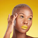 Thinking, makeup and black woman with skincare, cosmetics and dermatology on a yellow studio background. Female person, fantasy or model with facial, grooming and aesthetic with self care or beauty