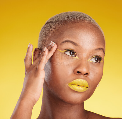 Buy stock photo Thinking, creative makeup and black woman with skincare, cosmetics and dermatology on a yellow studio background. Female person, fantasy and model with facial, beauty and aesthetic with self care