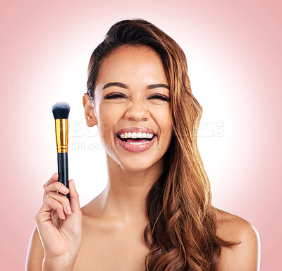 Buy stock photo Beauty, brush and portrait of woman with makeup on pink background for salon, wellness and luxury. Cosmetology, aesthetic and happy female person with tools for foundation, face cosmetics and glamour