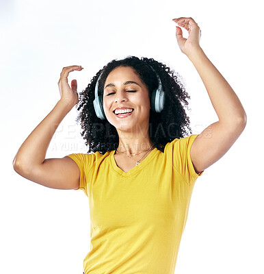 Buy stock photo Music, dancing and a woman with headphones in studio streaming audio, sound or radio. Energy, happy and a young female person isolated on a white background listening and moving to fun song to relax