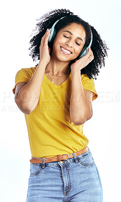 Buy stock photo Music, happy and a woman with headphones in studio streaming audio, sound or radio. Peace, smile and a young African person isolated on a white background listening to fun song to relax or meditate
