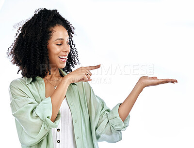 Buy stock photo Pointing, announcement or happy woman with sale, retail offer or discount deal isolated in studio. Hand, advertising or excited girl showing mockup space, news or menu promotion on white background