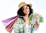 Happy woman, shopping and money in studio for cashback, award or giveaway on white background. Cash, winner and female customer with sale, payment or retail, competition or prize of financial freedom