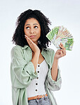 Woman, money fan and thinking in studio for prize, profit or bonus from investing, savings or notes by white background. Isolated African girl, student and decision for cash, win or gambling in lotto