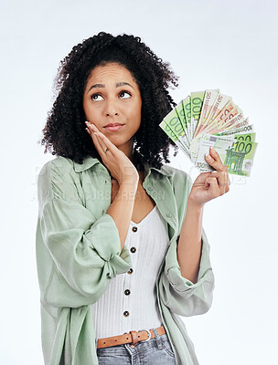 Buy stock photo Woman, money fan and thinking in studio for prize, profit or bonus from investing, savings or notes by white background. Isolated African girl, student and decision for cash, win or gambling in lotto