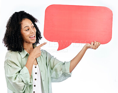 Buy stock photo Woman, smile and hand pointing to speech bubble in studio for social media, contact or info on white background. Happy, lady and show poster for voice, feedback or FAQ, forum or conversation quote