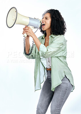 Buy stock photo Woman, megaphone and angry protest in studio with shouting, noise and politics by white background. Isolated African girl, student and audio tech for justice, speech and change in human rights goals