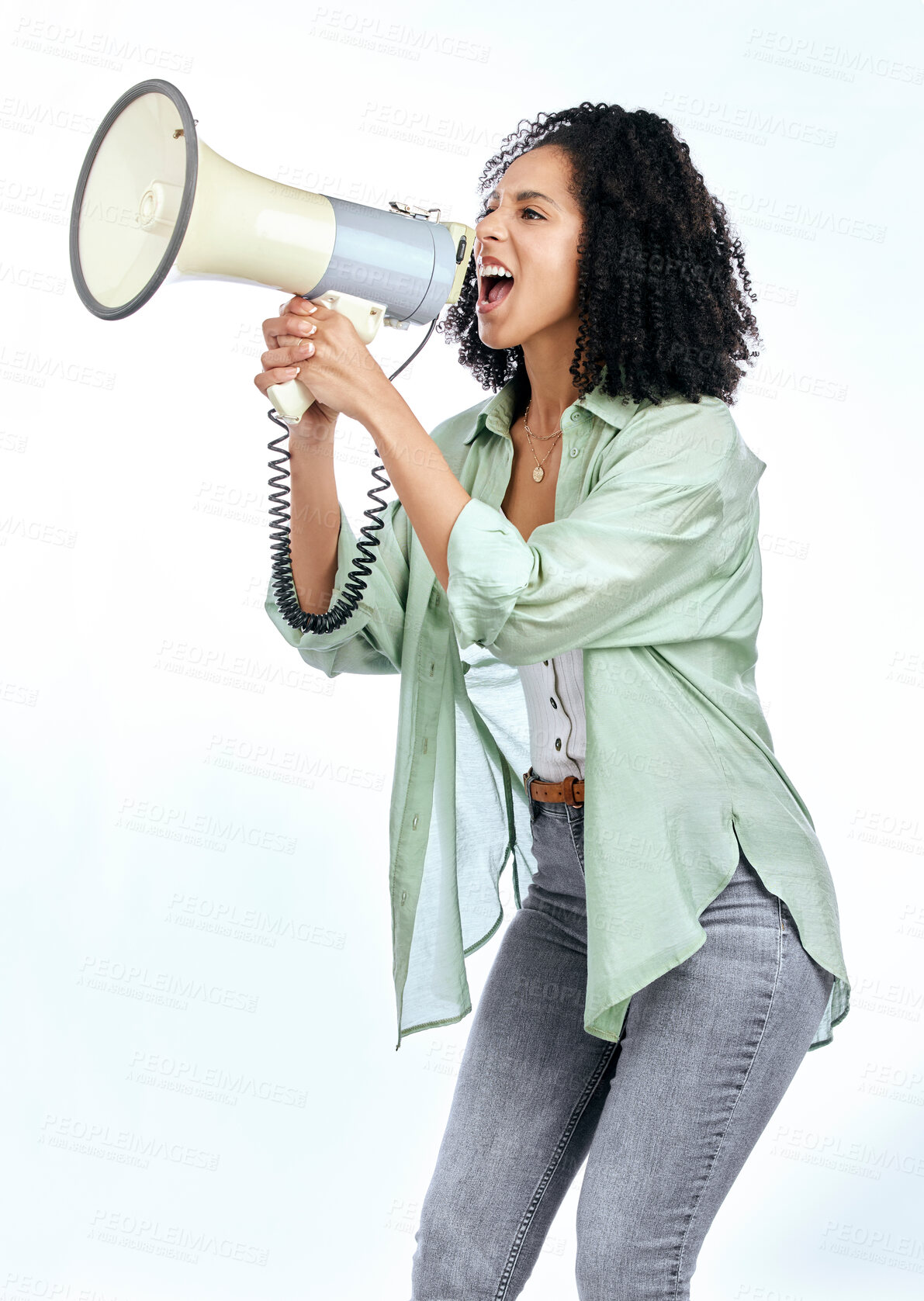 Buy stock photo Woman, megaphone and angry protest in studio with shouting, noise and politics by white background. Isolated African girl, student and audio tech for justice, speech and change in human rights goals