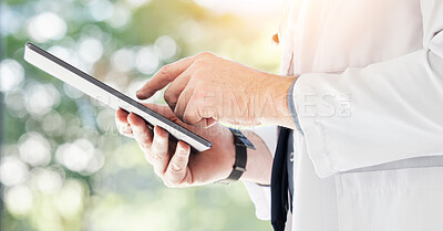 Buy stock photo Tablet, doctor and hands of man for healthcare services, hospital management and telehealth app. Closeup of medical employee working on digital technology for research, consulting data and planning