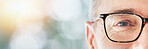 Portrait, mockup and a man in glasses for vision at the optometrist for prescription frame lenses. Eye, space and a male optometry customer at the optician for a healthcare appointment or checkup