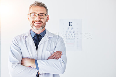 Buy stock photo Senior man, optometrist and portrait, arms crossed and smile, eye care clinic and healthcare with vision. Male person, ophthalmology and health for eyes, eyesight assessment and prescription glasses