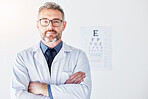 Senior man, arms crossed with optometrist in portrait, vision and glasses, eye care clinic and healthcare. Male person, ophthalmology and health for eyes, eyesight assessment and prescription lens