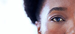 White background, eye and portrait of black woman for vision, eyesight and health with mockup space. Macro, eyes closeup and face of female person for biometric or retina scan, contact lens and exam