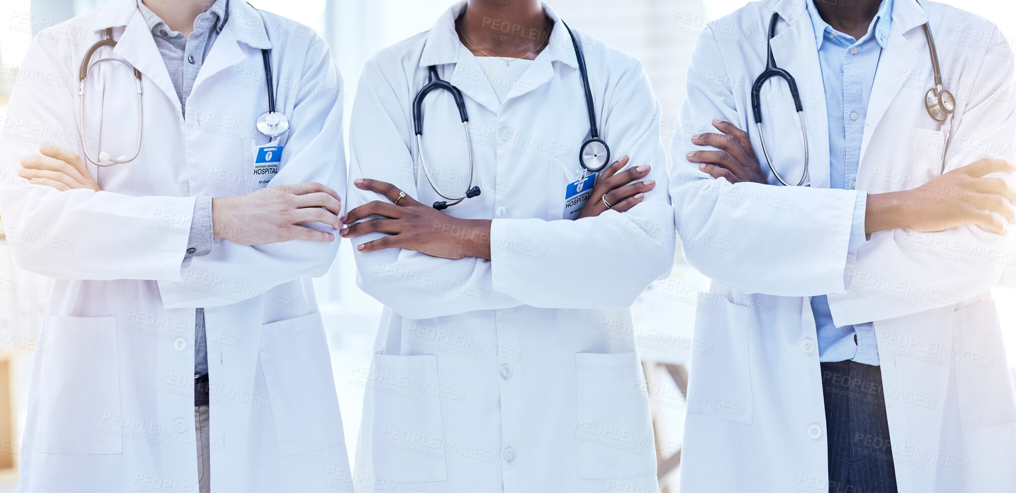 Buy stock photo Doctors, team and arms crossed with health, medical group and cardiology and surgeon collaboration in hospital. Confidence, solidarity in cardiovascular healthcare and professional people in medicine