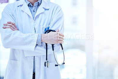 Stethoscope in hand, health and doctor with arms crossed, medical person and cardiology and surgeon in hospital. Mockup space, cardiovascular healthcare and professional expert in medicine at clinic