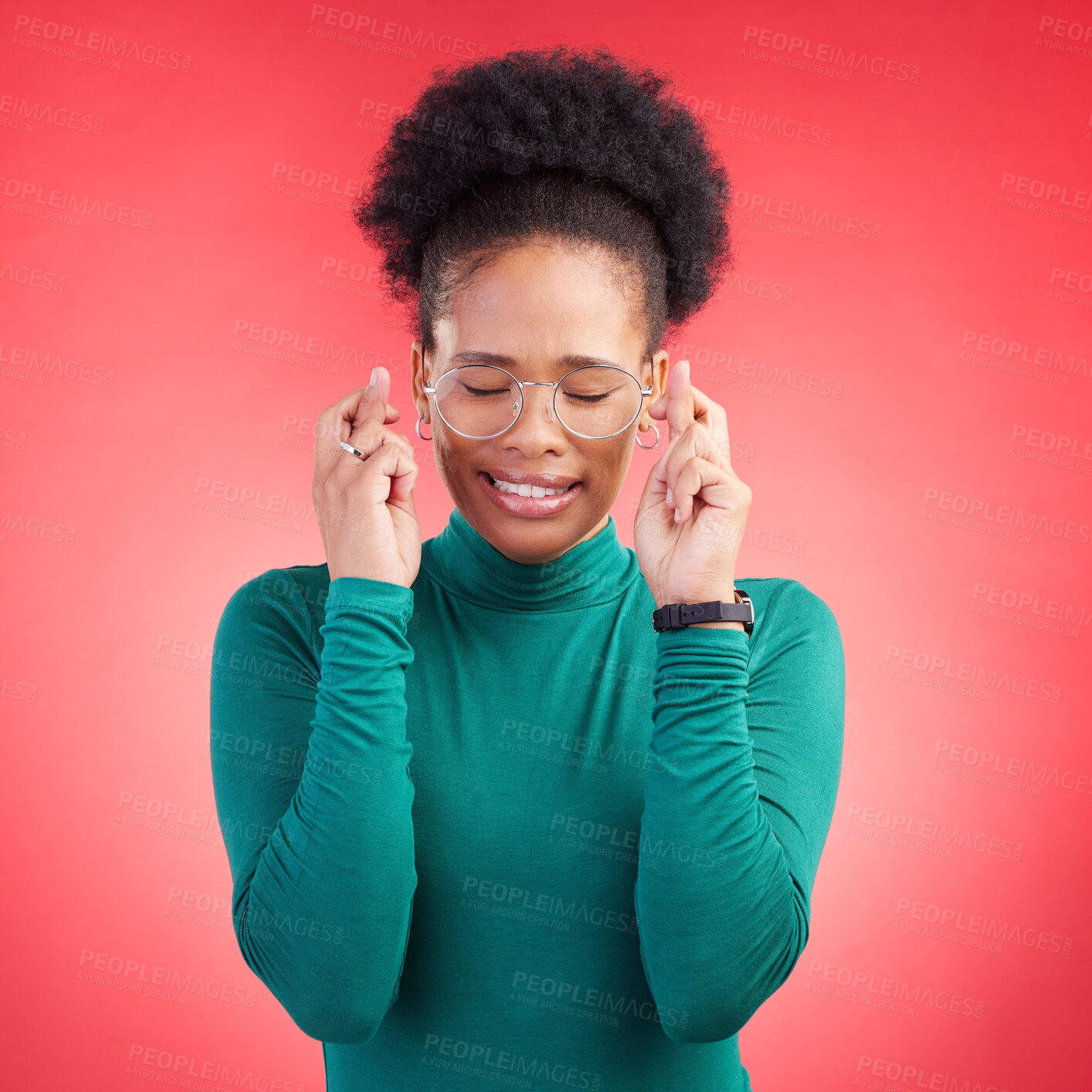 Buy stock photo Fingers crossed, praying and black woman in studio with good luck sign for bonus, prize or giveaway on red background. Hope, wish and African lady with pray emoji for waiting, reward or lotto results