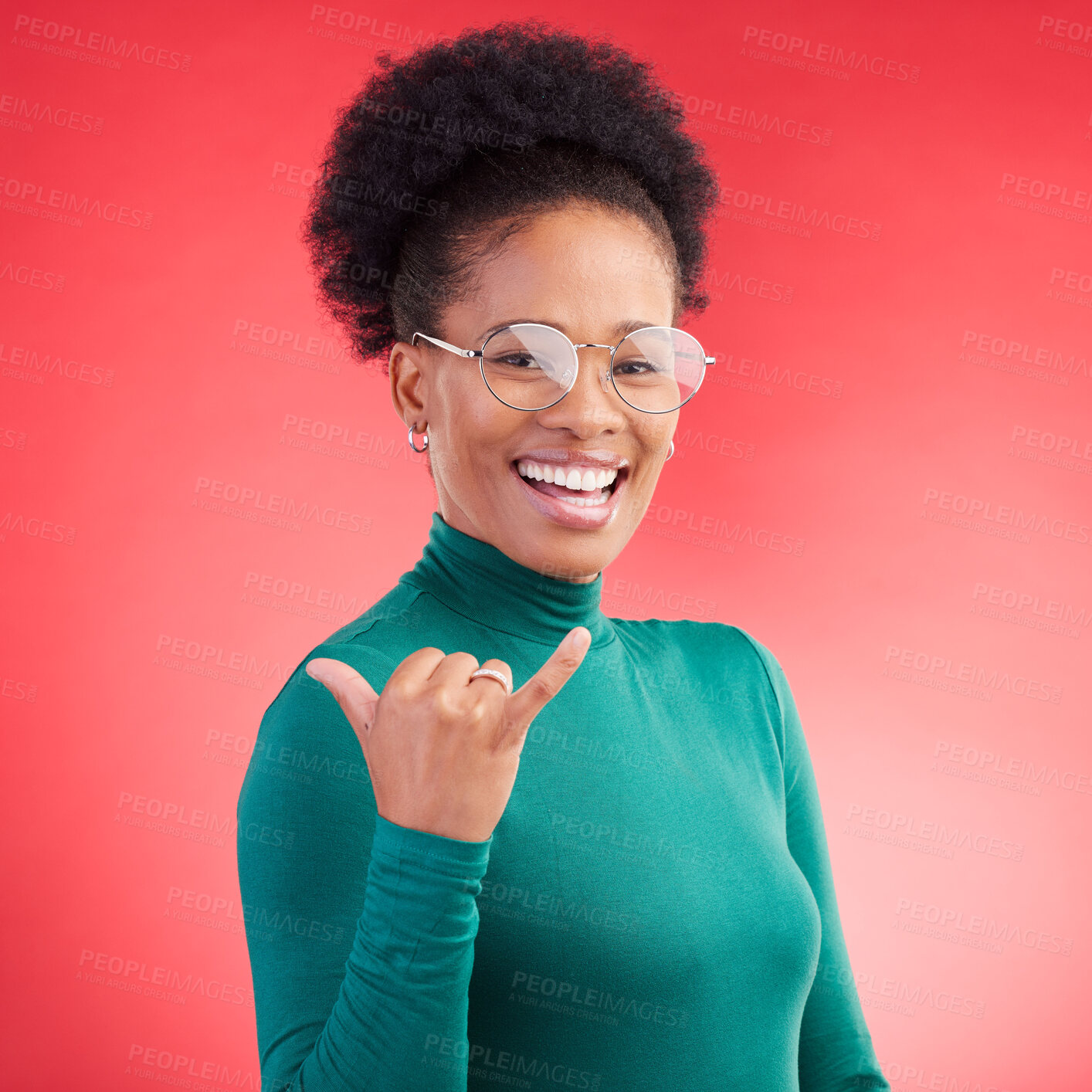 Buy stock photo Portrait, excited and black woman with call me hand in studio isolated on a red background with glasses. Face, happy and African person with shaka gesture, emoji sign and phone for communication 